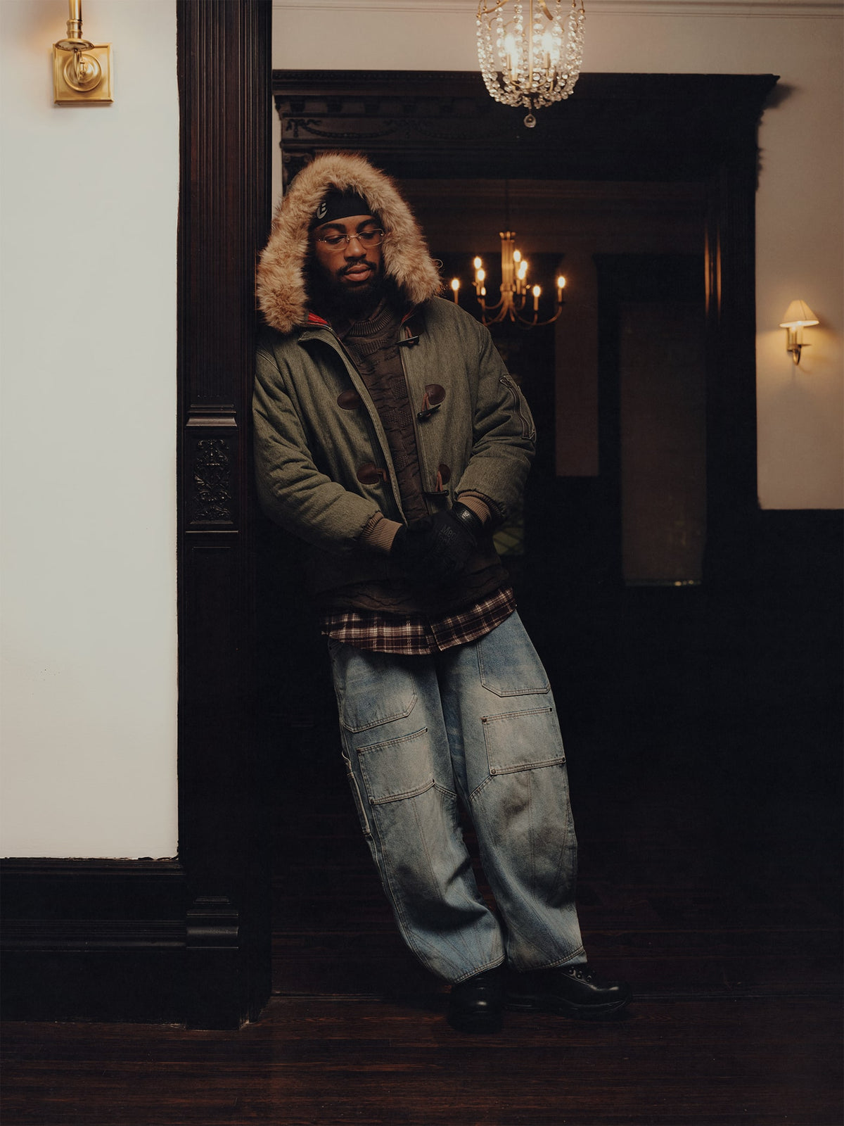 Squills (the rapper 454) and Brittney Shurley wearing Brigade FW26 in a Harlem Brownstone.