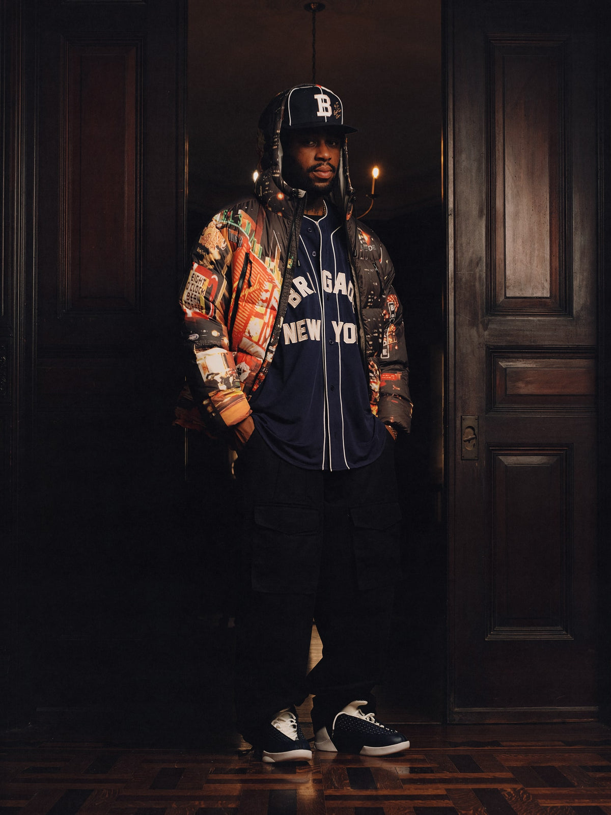 Squills (the rapper 454) and Brittney Shurley wearing Brigade FW26 in a Harlem Brownstone.