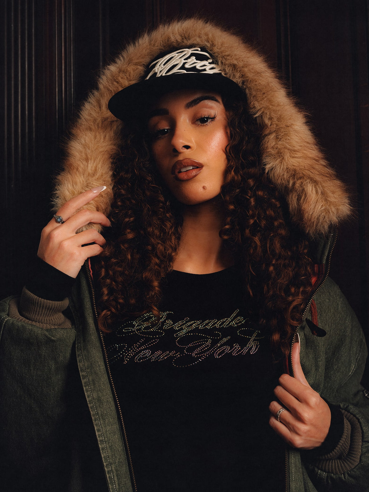 Squills (the rapper 454) and Brittney Shurley wearing Brigade FW26 in a Harlem Brownstone.