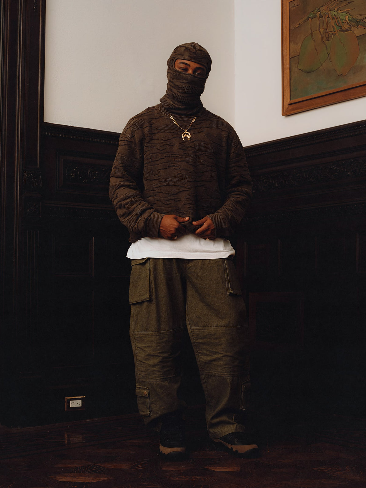 Squills (the rapper 454) and Brittney Shurley wearing Brigade FW26 in a Harlem Brownstone.