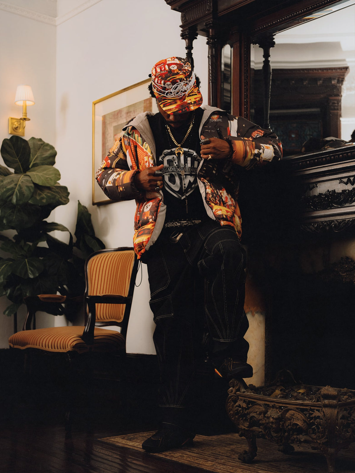 Squills (the rapper 454) and Brittney Shurley wearing Brigade FW26 in a Harlem Brownstone.